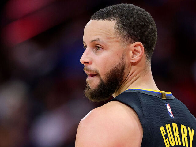 HOUSTON, TEXAS - FEBRUARY 13: Stephen Curry #30 of the Golden State Warriors looks on against the Houston Rockets during the first half at Toyota Center on February 13, 2025 in Houston, Texas.