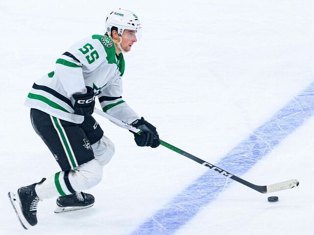 TORONTO, ON - JANUARY 14: Dallas Stars Defenceman Thomas Harley (55) skates with the puck during the NHL regular season game between the Dallas Stars and the Toronto Maple Leafs on January 14, 2025, at Scotiabank Arena in Toronto, ON, Canada.