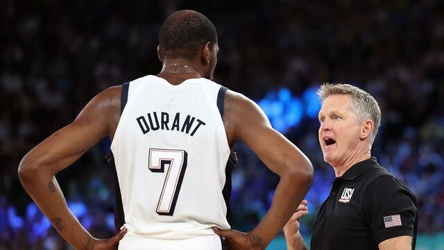 Coach Steve Kerr R of the United States talks with Kevin Durant during the men's basketball semifinal game between the United States and Serbia at the Paris 2024 Olympic Games in Paris, France, Aug. 8, 2024.
