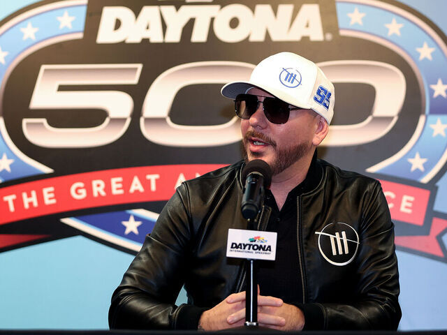 DAYTONA BEACH, FLORIDA - FEBRUARY 18: Singer and Trackhouse Racing Team co-owner Pitbull speaks to the media during a press conference after the NASCAR Cup Series Daytona 500 was postponed due to weather at Daytona International Speedway on February 18, 2024 in Daytona Beach, Florida.