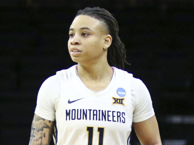 IOWA CITY, IOWA- MARCH 23: Guard JJ Quinerly #11 of the West Virginia Mountaineers during the second half against the Princeton Tigers during their match-up in the 2024 NCAA Division 1 Womens Basketball Championship at Carver-Hawkeye Arena on March 23, 2024 in Iowa City, Iowa.