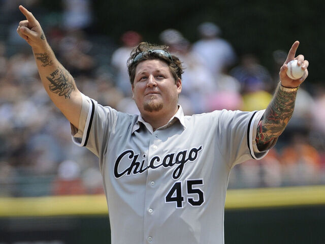 CHICAGO, IL - JULY 04: Former Chicago White Sox Bobby Jenks throws out the ceremonial first pitch before the game between the Chicago White Sox and the Baltimore Orioles on July 4, 2015 at U. S. Cellular Field in Chicago, Illinois.