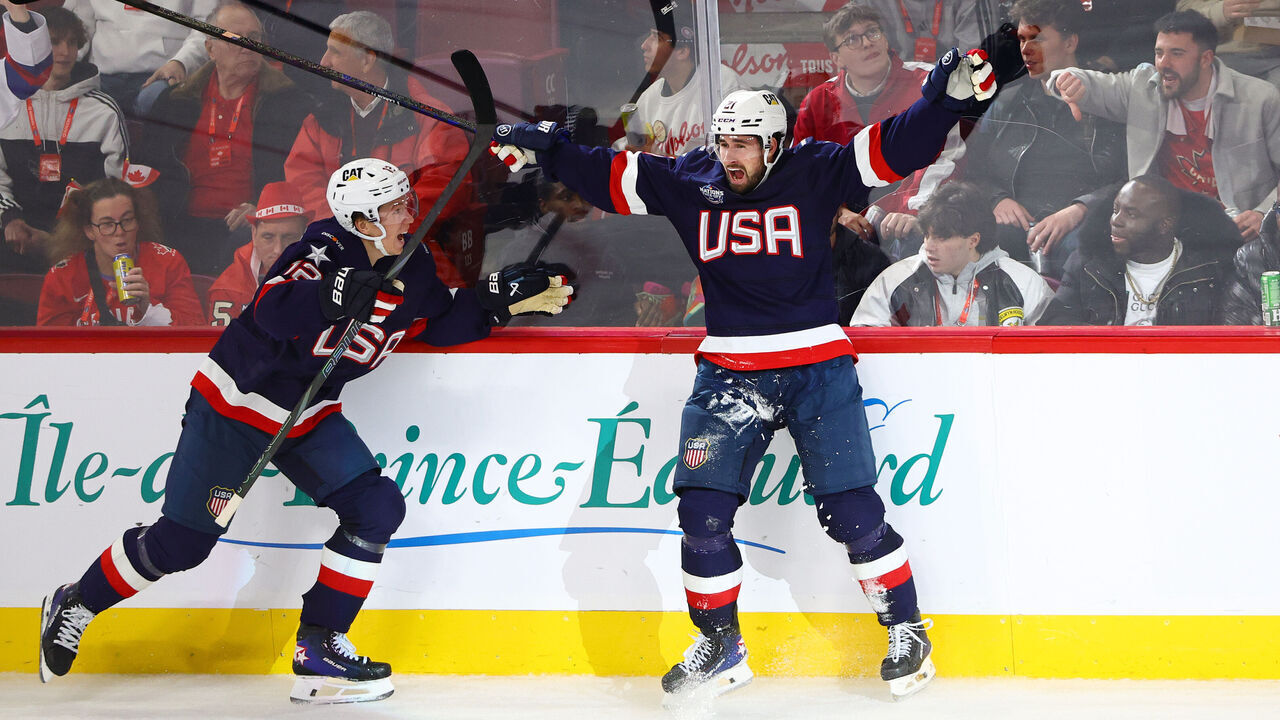 MONTREAL, QUEBEC - FEBRUARY 15: Matt Boldy #12 and Dylan Larkin #21 of Team United States react after Larkin scored a goal during the second period of the 4 Nations Face-Off game between the United States and Canada at Bell Centre on February 15, 2025 in Montreal, Quebec.