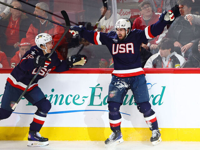 MONTREAL, QUEBEC - FEBRUARY 15: Matt Boldy #12 and Dylan Larkin #21 of Team United States react after Larkin scored a goal during the second period of the 4 Nations Face-Off game between the United States and Canada at Bell Centre on February 15, 2025 in Montreal, Quebec.