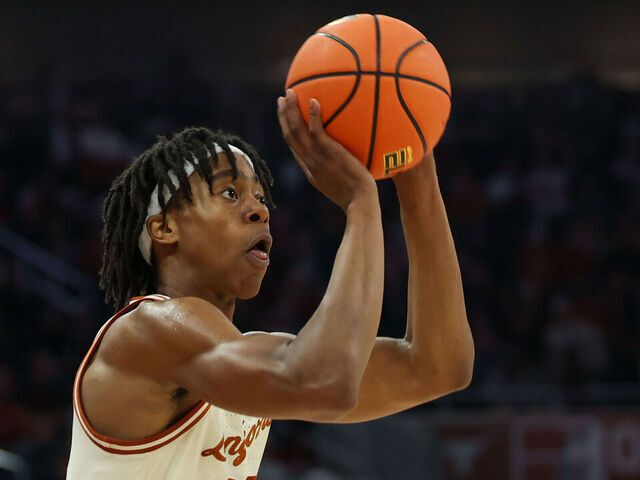AUSTIN, TX - FEBRUARY 11: Texas Longhorns guard Tre Johnson (20) takes a free throw during the SEC college basketball game between Texas Longhorns and Alabama Crimson Tide on February 11, 2025, at Moody Center in Austin, Texas.