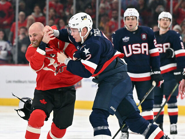 MONTREAL, CANADA - FEBRUARY 15: Brady Tkachuk #7 of Team USA and Sam Bennett #9 of Team Canada fight during the first period in the 4 Nations Face-Off game at the Bell Centre on February 15, 2025 in Montreal, Quebec, Canada.