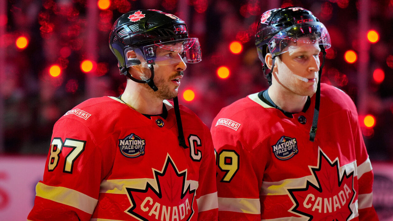 MONTREAL, QUEBEC - FEBRUARY 12: Sidney Crosby #87 and Nathan MacKinnon #29 of Team Canada look on after the 4 Nations Face-Off game between Canada and Sweden at Bell Centre on February 12, 2025 in Montreal, Quebec. Team Canada defeated Team Sweden in overtime 4-3.