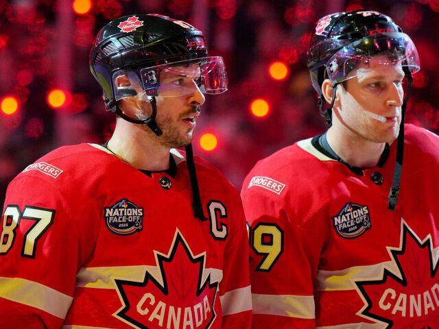 MONTREAL, QUEBEC - FEBRUARY 12: Sidney Crosby #87 and Nathan MacKinnon #29 of Team Canada look on after the 4 Nations Face-Off game between Canada and Sweden at Bell Centre on February 12, 2025 in Montreal, Quebec. Team Canada defeated Team Sweden in overtime 4-3.