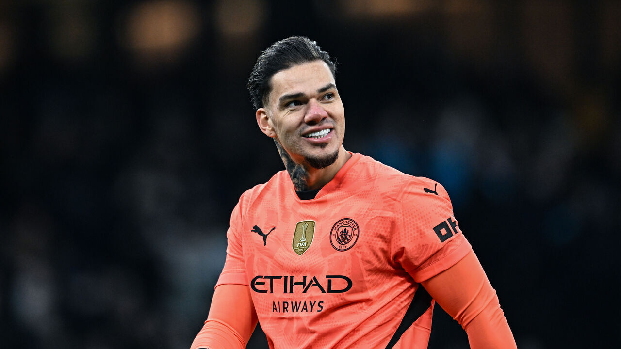 MANCHESTER, ENGLAND - FEBRUARY 15: Manchester City Goalkeeper Ederson smiles after Manchester score their fourth goal during the Premier League match between Manchester City FC and Newcastle United FC at Etihad Stadium on February 15, 2025 in Manchester, England.