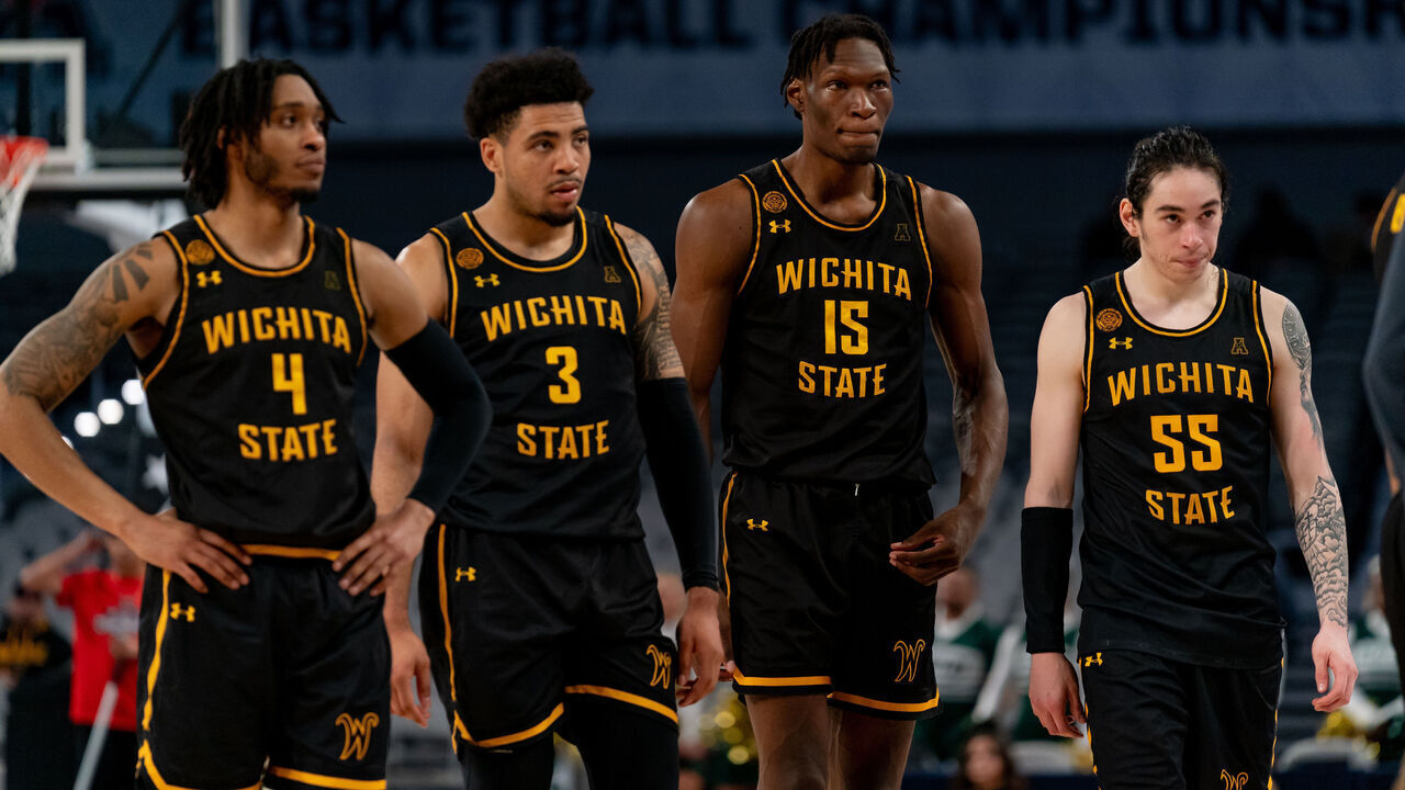 FORT WORTH, TX - MARCH 15:Wichita State Shockers guard Colby Rogers (4), Wichita State Shockers forward Ronnie DeGray III (3), Wichita State Shockers center Quincy Ballard (15), and Wichita State Shockers guard Bijan Cortes (55) walk to the sideline during the American Athletic Conference Championship tournament game between the Wichita State Shockers and UAB Blazers on March 15, 2024 at Dickies Arena in Fort Worth, Texas.