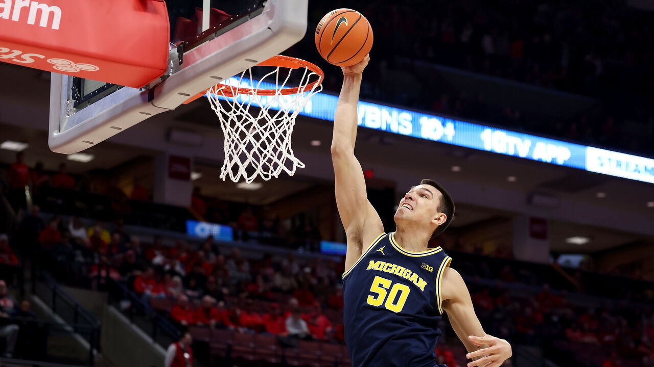 COLUMBUS, OHIO - FEBRUARY 16: Vladislav Goldin #50 of the Michigan Wolverines dunks the ball during the first half of the game against the Ohio State Buckeyes at Value City Arena on February 16, 2025 in Columbus, Ohio.