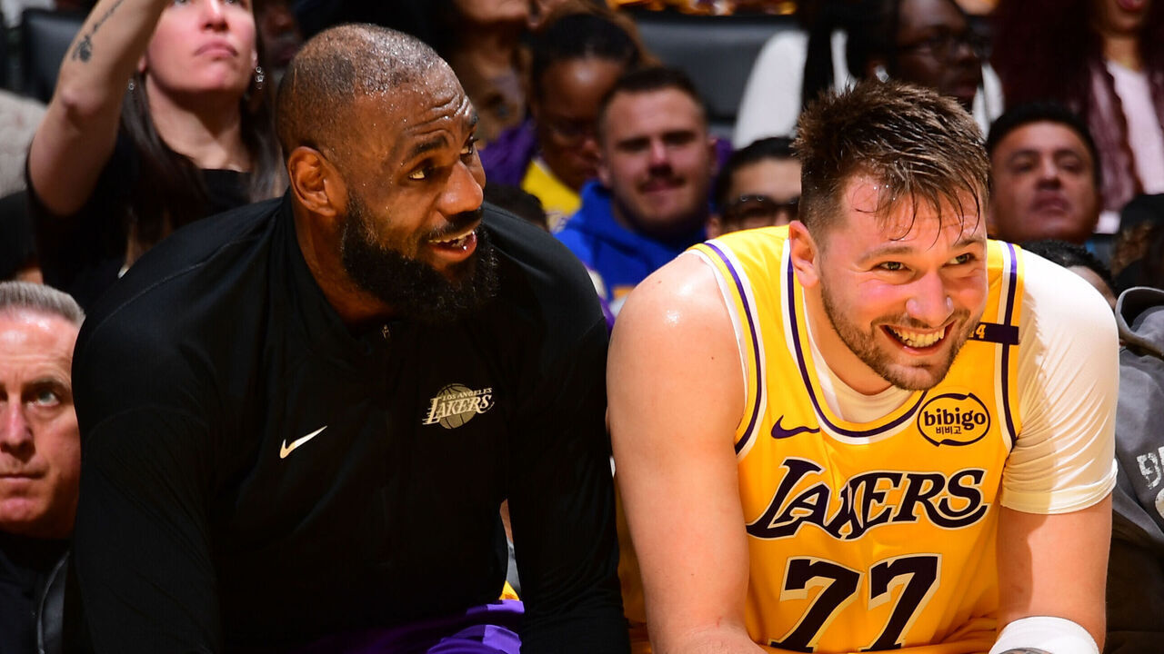 LOS ANGELES, CA - FEBRUARY 10: LeBron James #23 and Luka Doncic #77 of the Los Angeles Lakers smile during the game against the Utah Jazz on February 10, 2025 at Crypto.Com Arena in Los Angeles, California. NOTE TO USER: User expressly acknowledges and agrees that, by downloading and/or using this Photograph, user is consenting to the terms and conditions of the Getty Images License Agreement. Mandatory Copyright Notice: Copyright 2025 NBAE