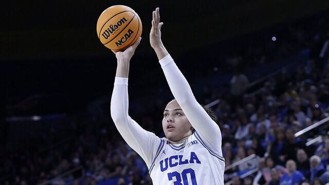 LOS ANGELES, CALIFORNIA - FEBRUARY 16: Timea Gardiner #30 of the UCLA Bruins makes a three-point shot against the Michigan State Spartans in the second half at UCLA Pauley Pavilion on February 16, 2025 in Los Angeles, California.