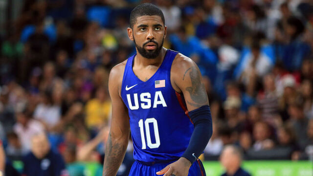 RIO DE JANEIRO, BRAZIL - AUGUST 21: Kyrie Irving #10 of the USA looks on during the Men's Gold medal game between Serbia and the USA on Day 16 of the Rio 2016 Olympic Games at Carioca Arena 1 on August 21, 2016 in Rio de Janerio, Brazil.