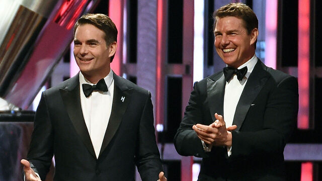 LAS VEGAS, NV - DECEMBER 04: NASCAR Sprint Cup Series driver Jeff Gordon (L) is introduced by actor Tom Cruise to accept the Bill France Award of Excellence during the 2015 NASCAR Sprint Cup Series Awards show at Wynn Las Vegas on December 4, 2015 in Las Vegas, Nevada.