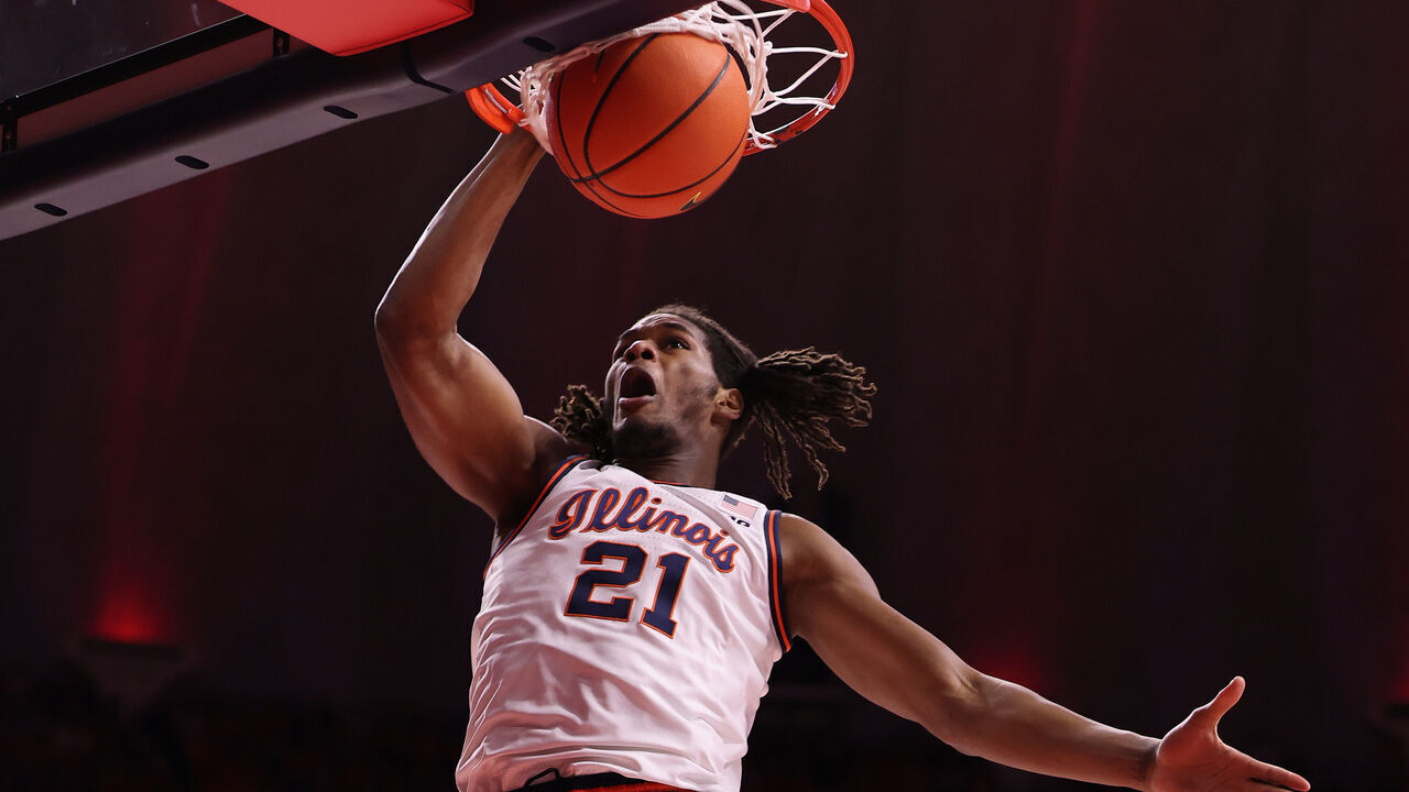 CHAMPAIGN, ILLINOIS - FEBRUARY 15: Morez Johnson Jr. #21 of the Illinois Fighting Illini dunks the ball against the Michigan State Spartans during the first half at State Farm Center on February 15, 2025 in Champaign, Illinois.