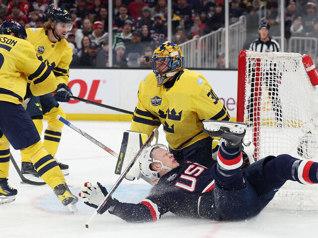 BOSTON, MASSACHUSETTS - FEBRUARY 17: Erik Karlsson #65 of Team Sweden trips up Brady Tkachuk #7 of Team USA during the first period in the 4 Nations Face-Off game at TD Garden on February 17, 2025 in Boston, Massachusetts. Tkachuk was injured on the play.