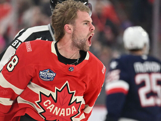 MONTREAL, CANADA - FEBRUARY 15: Brandon Hagel #38 of Team Canada gestures to the crowd following a first period fight against Matthew Tkachuk #19 of Team USA in the 4 Nations Face-Off game at the Bell Centre on February 15, 2025 in Montreal, Quebec, Canada.