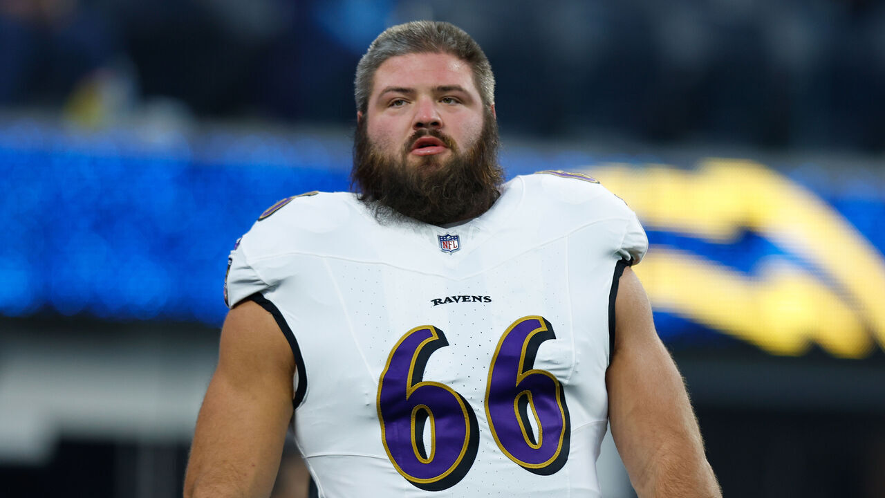 INGLEWOOD, CA - NOVEMBER 25: Baltimore Ravens guard Ben Cleveland (66) warms up before the NFL game between the Baltimore Ravens and the Los Angeles Chargers on November 25, 2024, at SoFi Stadium in Inglewood, CA.