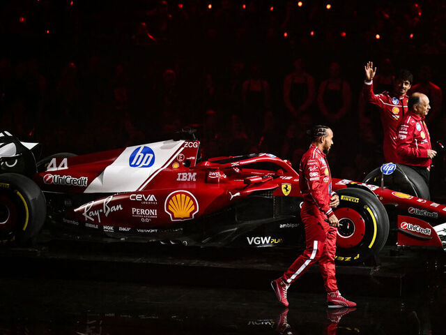 (From L) Ferrari's British driver Lewis Hamilton, Ferrari's French team principal Frederic Vasseur and Ferrari's Monaco driver Charles Leclerc stand by the new Formula 1 car of Ferrari Formula One Team during the Formula One - 2025 season launch "F1 75 LIVE" event at the O2, in London, on February 18, 2025.