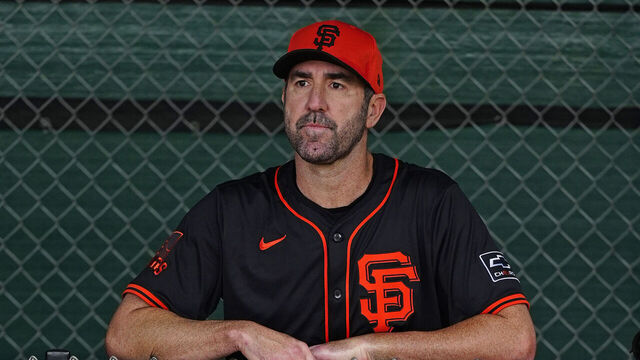 SCOTTSDALE, ARIZONA - FEBRUARY 16: Justin. Verlander #35 of the San Francisco Giants watches his teammates throw in the bullpen at Scottsdale Stadium on February 16, 2025 in Scottsdale, Arizona.