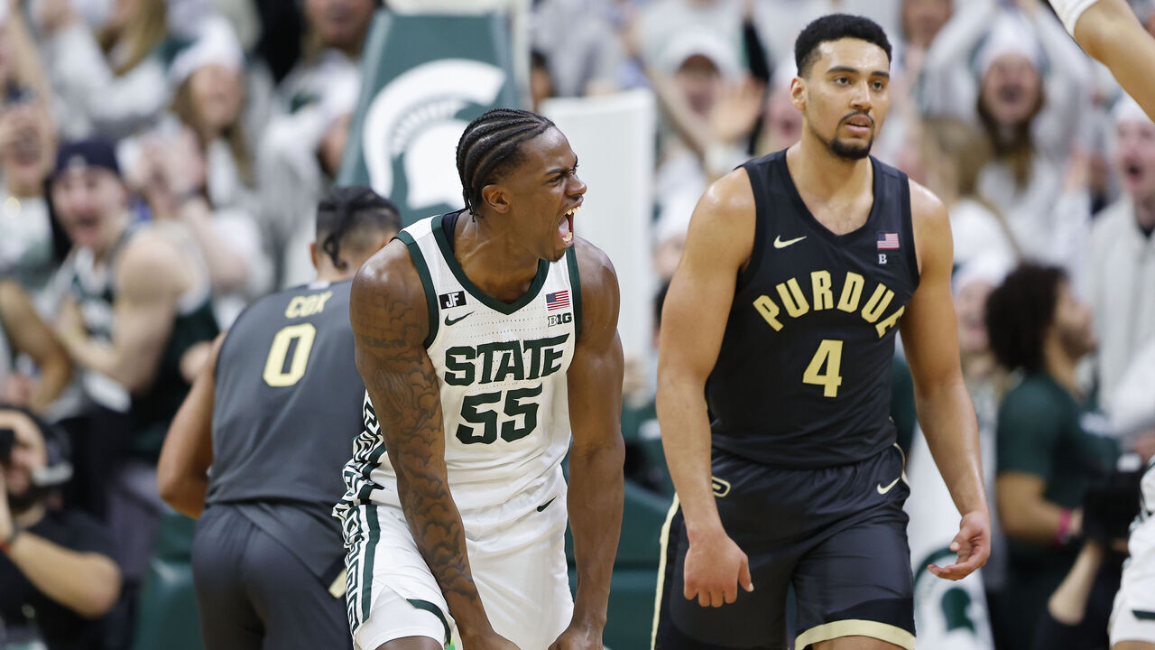 EAST LANSING, MICHIGAN - FEBRUARY 18: Coen Carr #55 of the Michigan State Spartans celebrates his dunk during the second half against the Purdue Boilermakers at Breslin Center on February 18, 2025 in East Lansing, Michigan.
