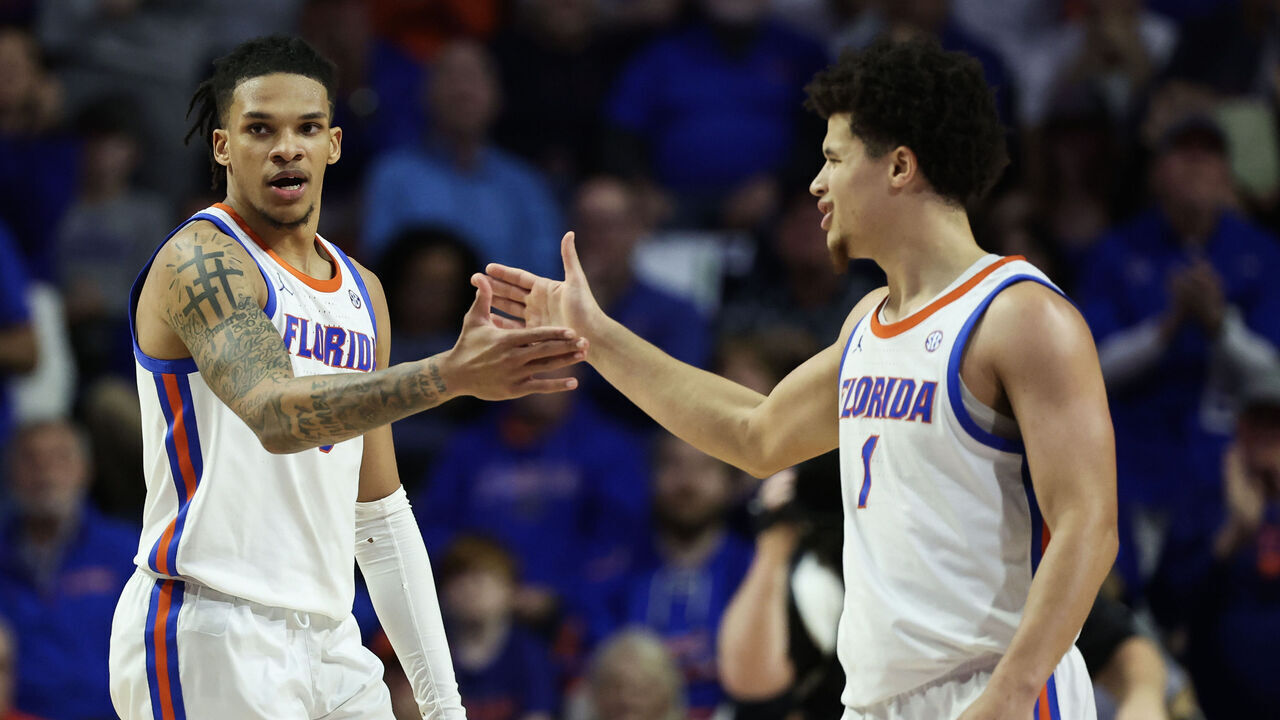 GAINESVILLE, FLORIDA - FEBRUARY 18: Will Richard #5 of the Florida Gators reacts with Walter Clayton Jr. #1 of the Florida Gators during the first half of a game against the Oklahoma Sooners at the Stephen C. O'Connell Center on February 18, 2025 in Gainesville, Florida.