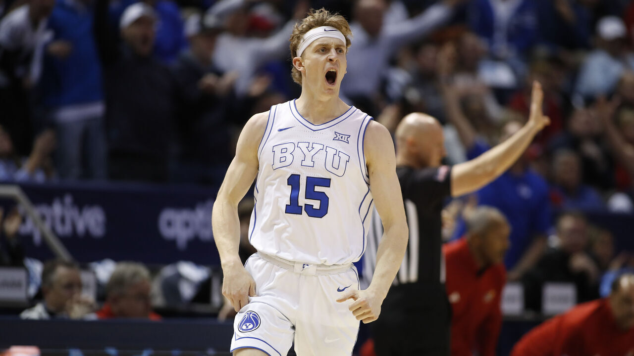 PROVO, UT - FEBRUARY 18: Richie Saunders #15 of the Brigham Young Cougars reacts after sinking a three pointer against the Kansas State Jayhawks during the first half of their game at the Jon M Huntsman Center on February 18, 2025 in Provo, Utah.