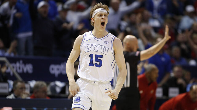 PROVO, UT - FEBRUARY 18: Richie Saunders #15 of the Brigham Young Cougars reacts after sinking a three pointer against the Kansas State Jayhawks during the first half of their game at the Jon M Huntsman Center on February 18, 2025 in Provo, Utah.
