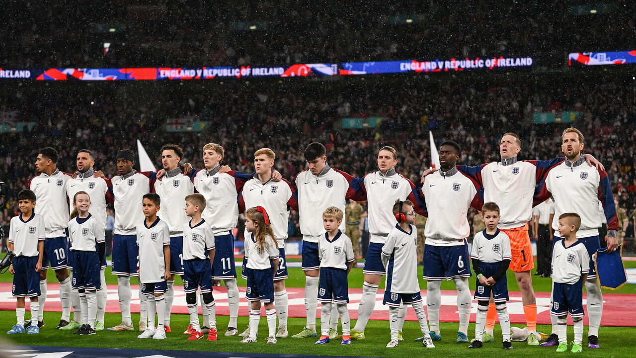 England , United Kingdom - 17 November 2024; The England team, from left, Jude Bellingham, Kyle Walker, Noni Madueke, Curtis Jones, Anthony Gordon, Lewis Hall, Tino Livramento, Conor Gallagher, Marc Guéhi, Jordan Pickford and Harry Kane stand for the playing of the National Anthem before the UEFA Nations League B Group 2 match between England and Republic of Ireland at Wembley Stadium in London, England.