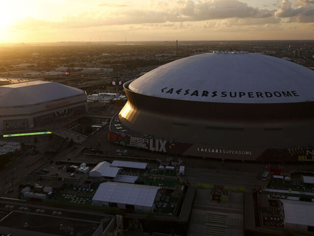 NEW ORLEANS, LOUISIANA - FEBRUARY 8: A general overall exterior view of sunset behind Caesars Superdome ahead of the NFL Super Bowl LIX football game between the Philadelphia Eagles and the Kansas City Chiefs on February 8, 2025 in New Orleans, Louisiana.