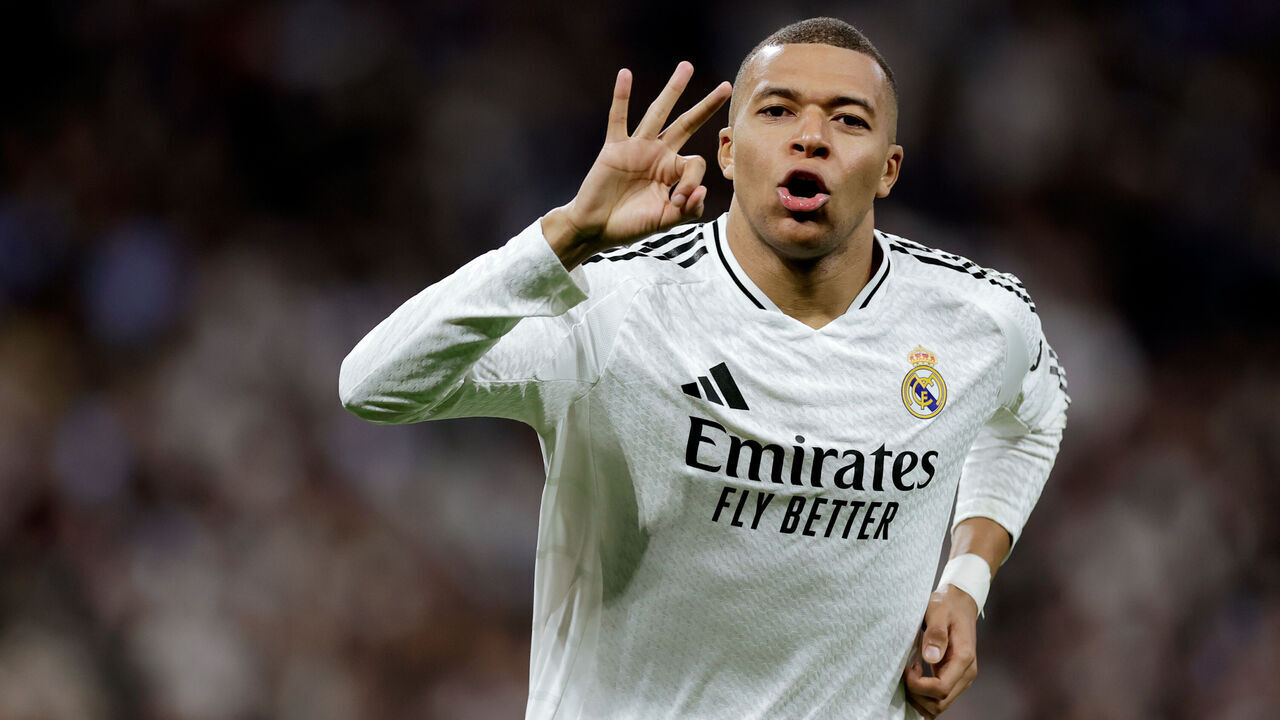 MADRID, SPAIN - FEBRUARY 19: Kylian Mbappe of Real Madrid celebrates 3-0 during the UEFA Champions League match between Real Madrid v Manchester City at the Estadio Santiago Bernabeu on February 19, 2025 in Madrid Spain