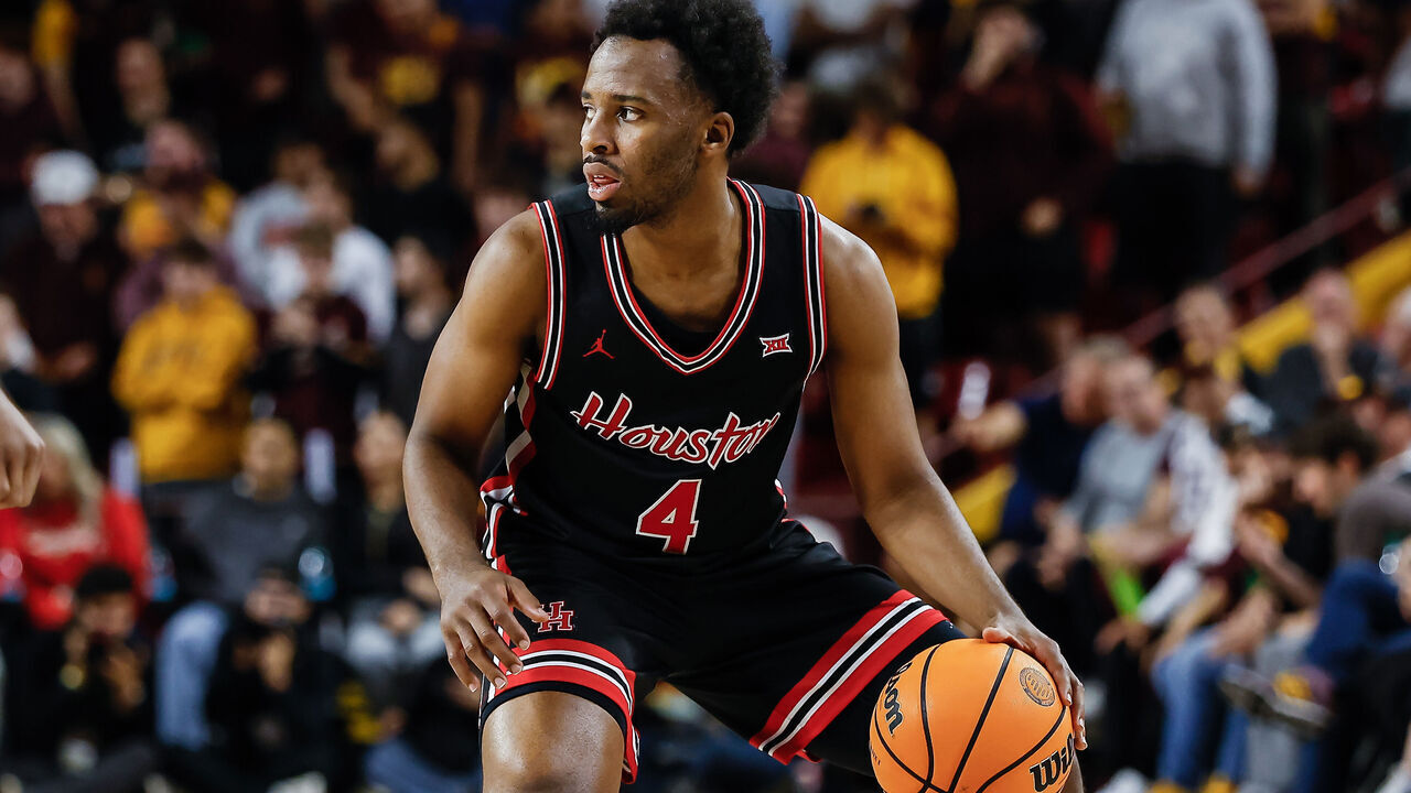 SCOTTSDALE, AZ - FEBRUARY 18: Houston Cougars guard L.J. Cryer (4) controls the ball during the college basketball game between the Houston Cougars and the Arizona State Sun Devils on February 18, 2025 at Desert Financial Arena in Tempe, Arizona.