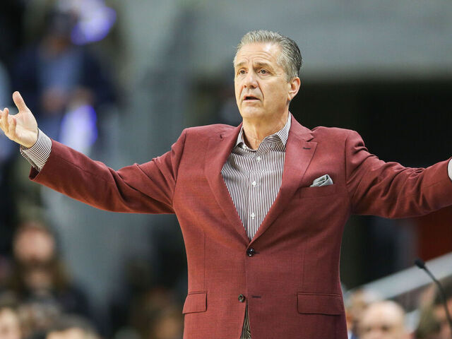 AUBURN, ALABAMA - FEBRUARY 19: Head coach John Calipari of the Arkansas Razorbacks argues call during the first half against the Auburn Tigers at Neville Arena on February 19, 2025 in Auburn, Alabama.