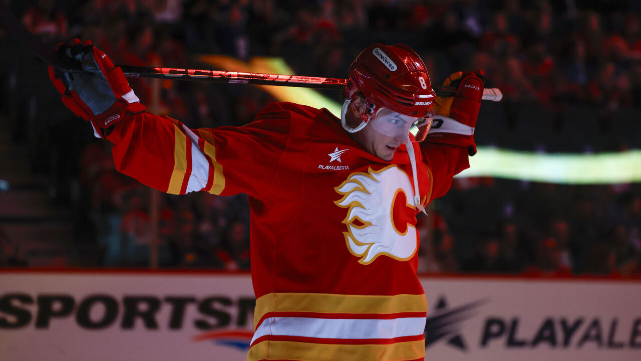 CALGARY, CANADA - FEBRUARY 04: Tyson Barrie #8 of the Calgary Flames stretches during warmup before the game against the Toronto Maple Leafs at the Scotiabank Saddledome on February 04, 2025, in Calgary, Alberta, Canada.