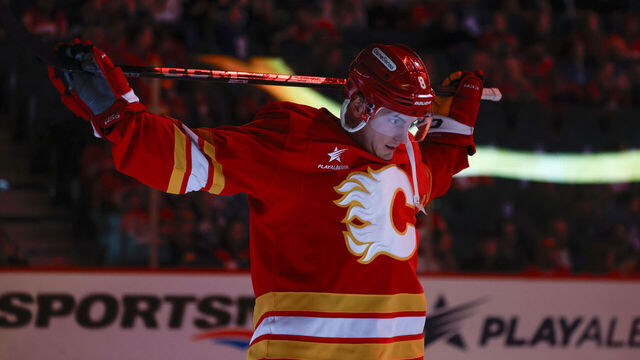 CALGARY, CANADA - FEBRUARY 04: Tyson Barrie #8 of the Calgary Flames stretches during warmup before the game against the Toronto Maple Leafs at the Scotiabank Saddledome on February 04, 2025, in Calgary, Alberta, Canada.