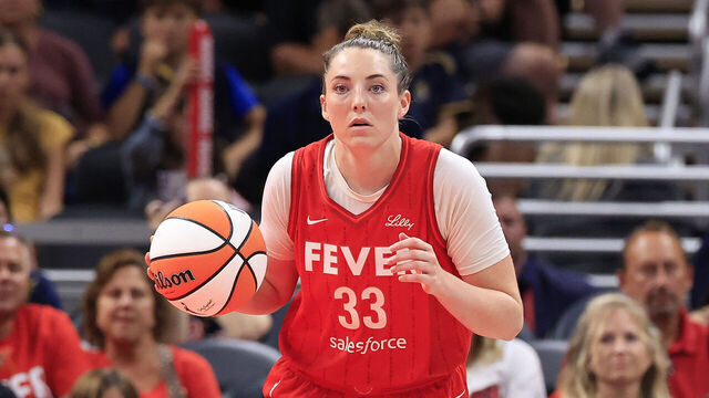 INDIANAPOLIS, INDIANA - AUGUST 16: Katie Lou Samuelson #33 of the Indiana Fever brings the ball up the court in the game against the Phoenix Mercury at Gainbridge Fieldhouse on August 16, 2024 in Indianapolis, Indiana.