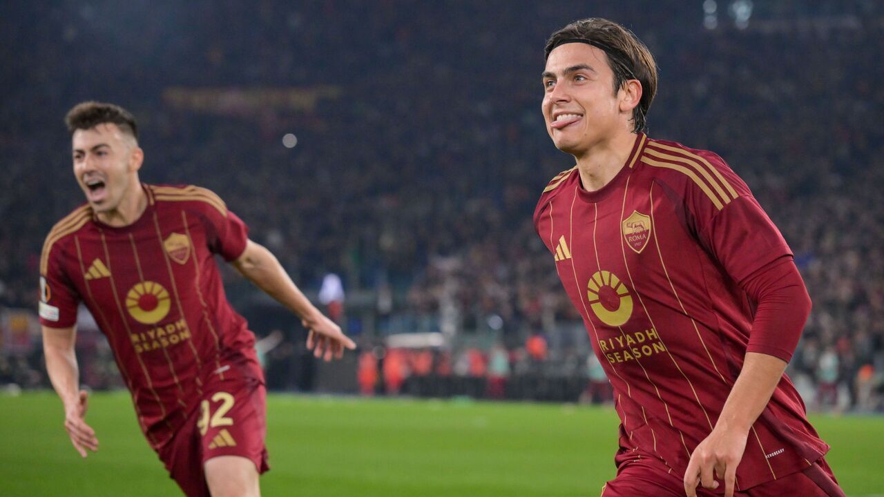 ROME, ITALY - FEBRUARY 20: Paulo Dybala of AS Roma celebrates after scoring the goal to make it 2-1 during the UEFA Europa League 2024/25 League Knockout Play-off Second Leg match between AS Roma and FC Porto at Stadio Olimpico on February 20, 2025 in Rome, Italy.