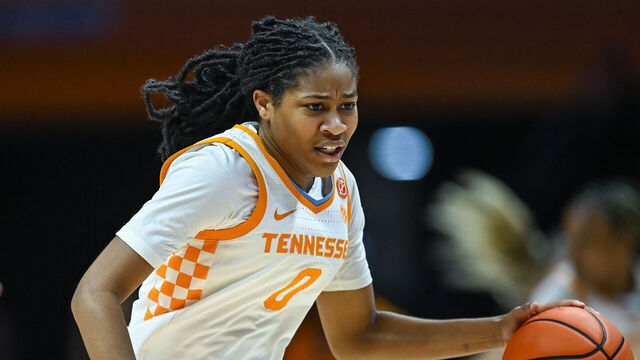 KNOXVILLE, TN - FEBRUARY 06: Tennessee Lady Vols guard Jewel Spear (0) pushes the ball up the court on UConn Huskies guard KK Arnold (2) during the women's college basketball game between the Tennessee Lady Vols and the UConn Huskies on February 6, 2025, at Food City Center in Knoxville, TN.