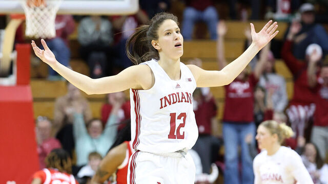 BLOOMINGTON, INDIANA - FEBRUARY 20: Yarden Garzon #12 of the Indiana Hoosiers celebrates after making a basket in the fourth quarter of the game against the Ohio State Buckeyes at Simon Skjodt Assembly Hall on February 20, 2025 in Bloomington, Indiana.