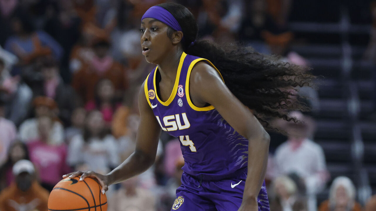 AUSTIN, TX - FEBRUARY 16: LSU Lady Tigers guard Flau'Jae Johnson (4) dribbles up the court against the Texas Longhorns during the game on February 16, 2025, at the Moody Center in Austin, TX.