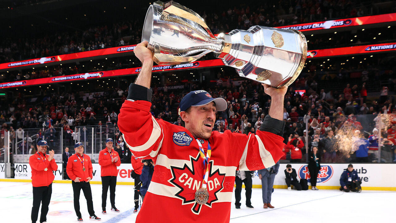 BOSTON, MASSACHUSETTS - FEBRUARY 20: Brad Marchand #63 of Team Canada celebrates with his teammates after defeating Team United States in overtime to win the NHL 4 Nations Face-Off Championship Game at TD Garden on February 20, 2025 in Boston, Massachusetts.