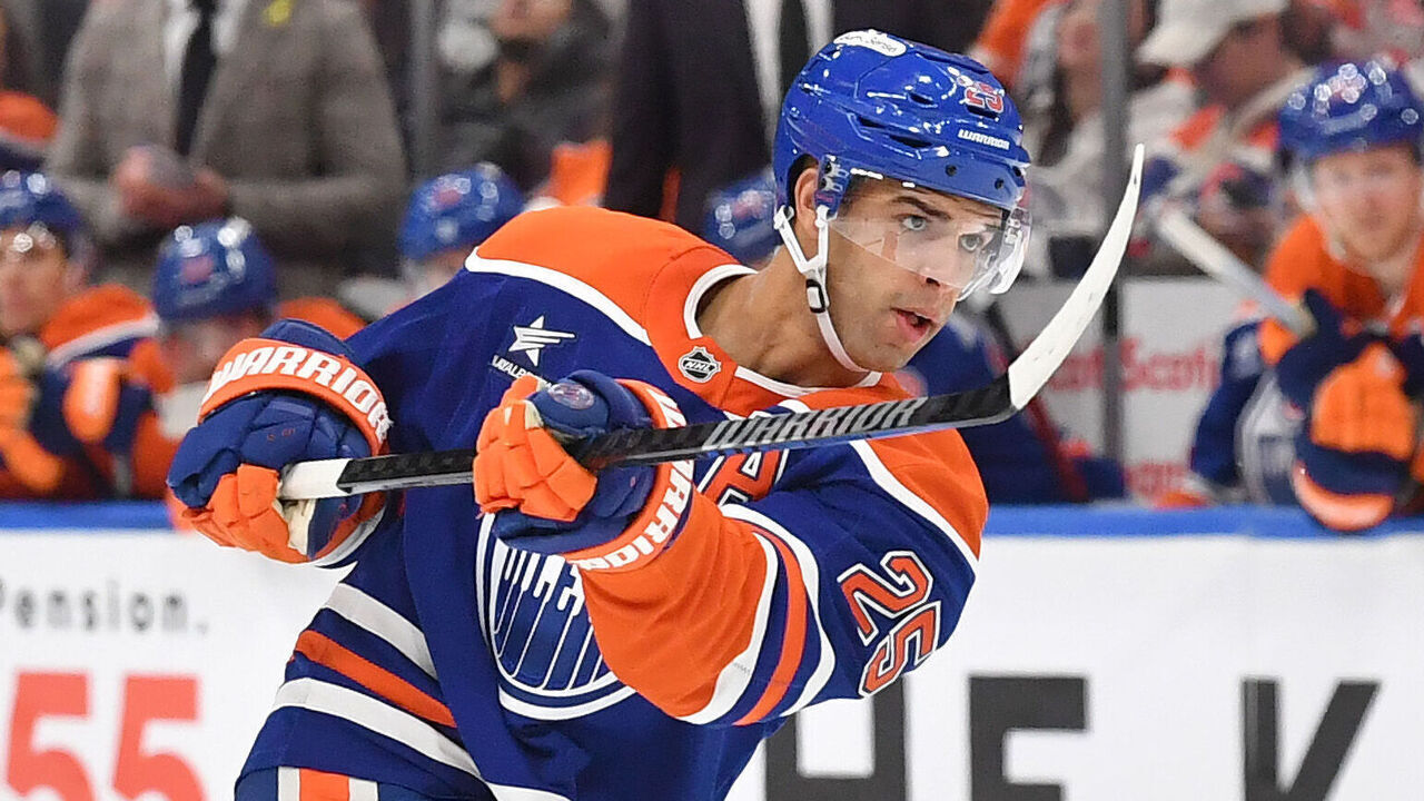 EDMONTON, CANADA - JANUARY 21: Darnell Nurse #25 of the Edmonton Oilers takes a shot during the third period of the game against the Washington Capitals at Rogers Place on January 21, 2025, in Edmonton, Alberta, Canada.