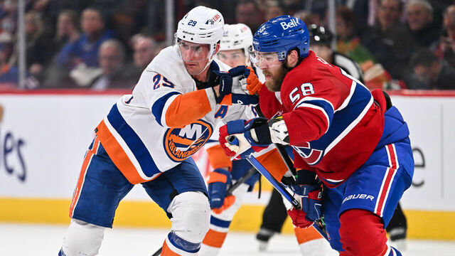 MONTREAL, CANADA - JANUARY 25: Brock Nelson #29 of the New York Islanders and David Savard #58 of the Montreal Canadiens skate against each other during the third period at the Bell Centre on January 25, 2024 in Montreal, Quebec, Canada. The Montreal Canadiens defeated the New York Islanders 4-3.
