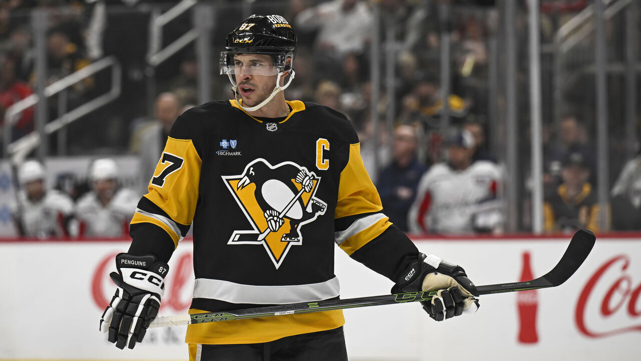 PITTSBURGH, PA - FEBRUARY 22: Pittsburgh Penguins center Sidney Crosby (87) looks on during the first period in the NHL game between the Pittsburgh Penguins and the Washington Capitals on February 22, 2025, at PPG Paints Arena in Pittsburgh, PA.