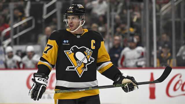 PITTSBURGH, PA - FEBRUARY 22: Pittsburgh Penguins center Sidney Crosby (87) looks on during the first period in the NHL game between the Pittsburgh Penguins and the Washington Capitals on February 22, 2025, at PPG Paints Arena in Pittsburgh, PA.