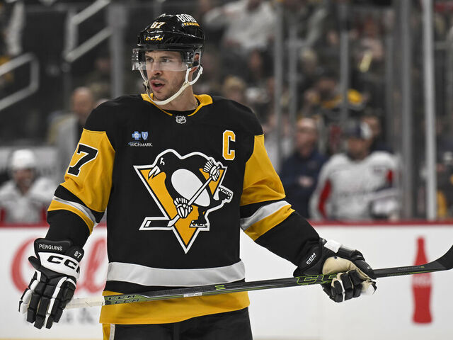PITTSBURGH, PA - FEBRUARY 22: Pittsburgh Penguins center Sidney Crosby (87) looks on during the first period in the NHL game between the Pittsburgh Penguins and the Washington Capitals on February 22, 2025, at PPG Paints Arena in Pittsburgh, PA.