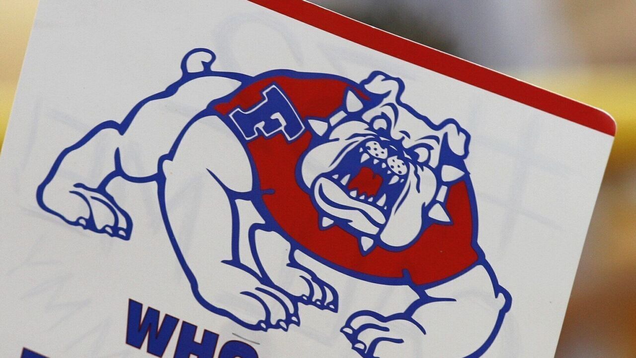 OMAHA, NE - JUNE 23: A fan holds up a sign for the Fresno State Bulldogs during Game 1 of the 2008 Men's College World Series Championship of the Georgia Bulldogs on June 23, 2008 at Rosenblatt Stadium in Omaha, Nebraska.
