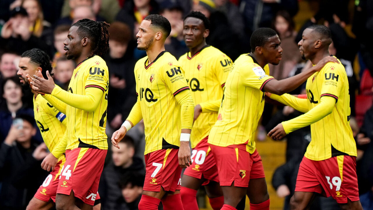 Watford's Tom Dele-Bashiru (second left) celebrates scoring their side's first goal of the game during the Sky Bet Championship match at Vicarage Road, Watford. Picture date: Sunday February 23, 2025.