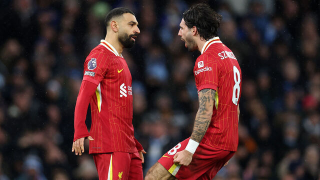 MANCHESTER, ENGLAND - FEBRUARY 23: Dominik Szoboszlai of Liverpool celebrates scoring his team's second goal with teammate Mohamed Salah during the Premier League match between Manchester City FC and Liverpool FC at Etihad Stadium on February 23, 2025 in Manchester, England.